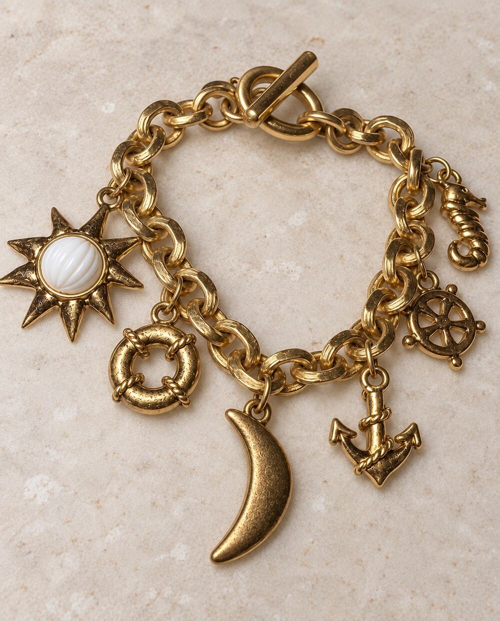 Vintage Monet nautical gold tone charm bracelet